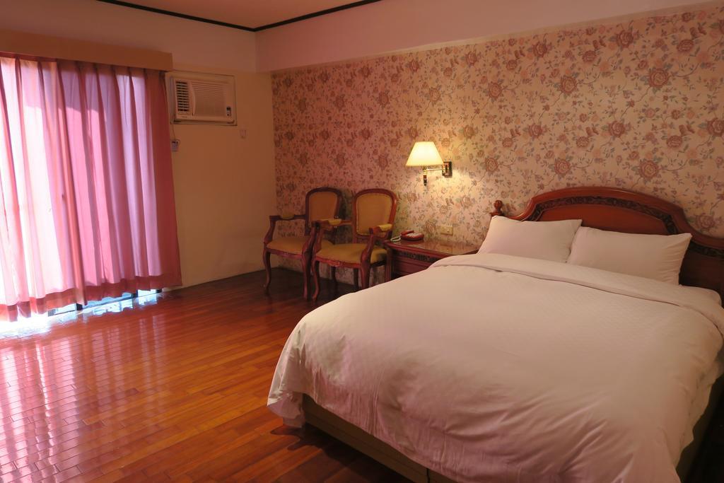 Champagne Hotel Jiaoxi Cameră foto