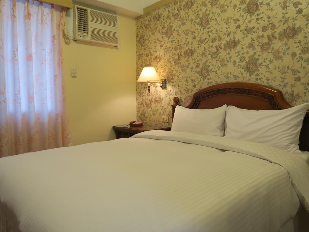 Champagne Hotel Jiaoxi Cameră foto